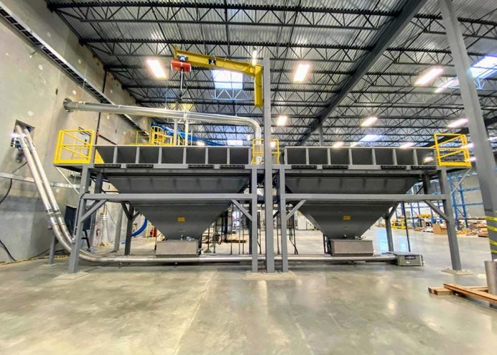 The mezzanine lifting side with lifting arm. Ingredient management system funnel