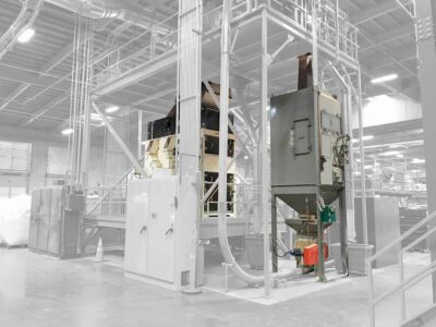 Green bean cleaner (left) and surge bin (right) highlighted.