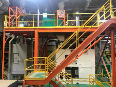 Side view of the cleaning mezzanine. green bean cleaner surge bin magnet