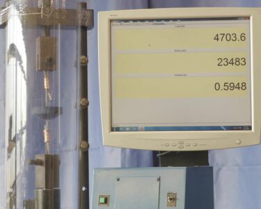 (Figure 2) Cable conveyor sample under a tension load of 4,704 lb before failure. Cable Tensile Stregth Sample Test