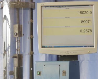 (Figure 1) Chain link under a tension load of 18,021 lb before failure. Chain Tensile Stregth Sample Test