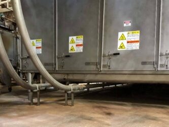 A Chain-Vey snaking underneath kibble reclaim equipment. Notice the limited vertical space which Chain-Vey adeptly handles. conveyor under reclaim station